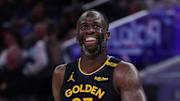 Golden State Warriors forward Draymond Green (23) smiles during a break in the action against the San Antonio Spurs.