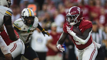 Oct 26, 2024; Tuscaloosa, Alabama, USA;  Alabama Crimson Tide running back Richard Young (9) runs the ball against the Missouri Tigers during the fourth quarter at Bryant-Denny Stadium. Mandatory Credit: Will McLelland-Imagn Images