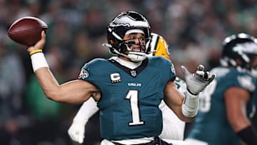 Jan 12, 2025; Philadelphia, Pennsylvania, USA; Philadelphia Eagles quarterback Jalen Hurts (1) drops back to pass against the Green Bay Packers during the first half in an NFC wild card game at Lincoln Financial Field. Mandatory Credit: Bill Streicher-Imagn Images