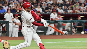 Sep 25, 2024; Phoenix, Arizona, USA; Arizona Diamondbacks first base Christian Walker (53) hits an RBI single in the fourth inning against the San Francisco Giants at Chase Field. Mandatory Credit: Matt Kartozian-Imagn Images