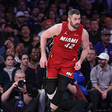 Jan 27, 2024; New York, New York, USA; Miami Heat forward Kevin Love (42) runs up court after making a basket against the New York Knicks during the second half at Madison Square Garden. Mandatory Credit: Vincent Carchietta-Imagn Images
