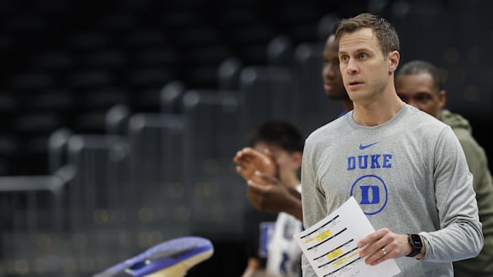 Mar 26, 2026; Washington, DC, USA; Duke Blue Devils head coach Jon Scheyer stands on the court during a practice session ahead of the east regional of the men's 2026 NCAA Tournament at Capital One Arena. Mandatory Credit: Geoff Burke-Imagn Images
