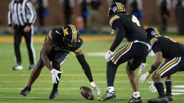 Missouri defensive back Jaylon Carlies (1) recovers a fumble from Tennessee quarterback Joe Milton III (7) during an NCAA college football game on Saturday, November 11, 2023 in Columbia, MO.