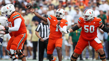 Nov 9, 2024; Atlanta, Georgia, USA; Miami Hurricanes quarterback Cam Ward (1) throws a pass against the Georgia Tech Yellow Jackets in the second quarter at Bobby Dodd Stadium at Hyundai Field. Mandatory Credit: Brett Davis-Imagn Images