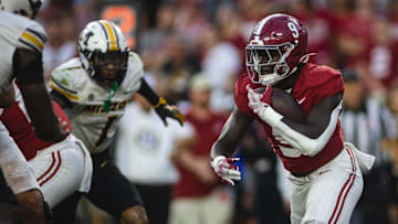 Oct 26, 2024; Tuscaloosa, Alabama, USA;  Alabama Crimson Tide running back Richard Young (9) runs the ball against the Missouri Tigers during the fourth quarter at Bryant-Denny Stadium. Mandatory Credit: Will McLelland-Imagn Images