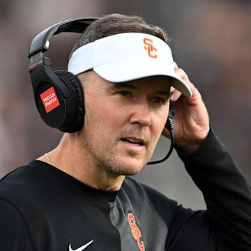 Sep 13, 2025; West Lafayette, Indiana, USA; Southern California Trojans head coach Lincoln Riley stands on the sidelines during the first quarter against the Purdue Boilermakers at Ross-Ade Stadium. Mandatory Credit: Marc Lebryk-Imagn Images