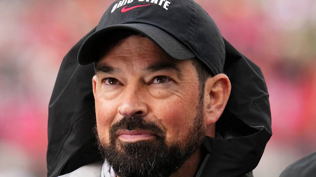 Ohio State Buckeyes head coach Ryan Day prepares for a tv interview during the Ohio State football spring game at Ohio Stadium in Columbus on April 18, 2026.