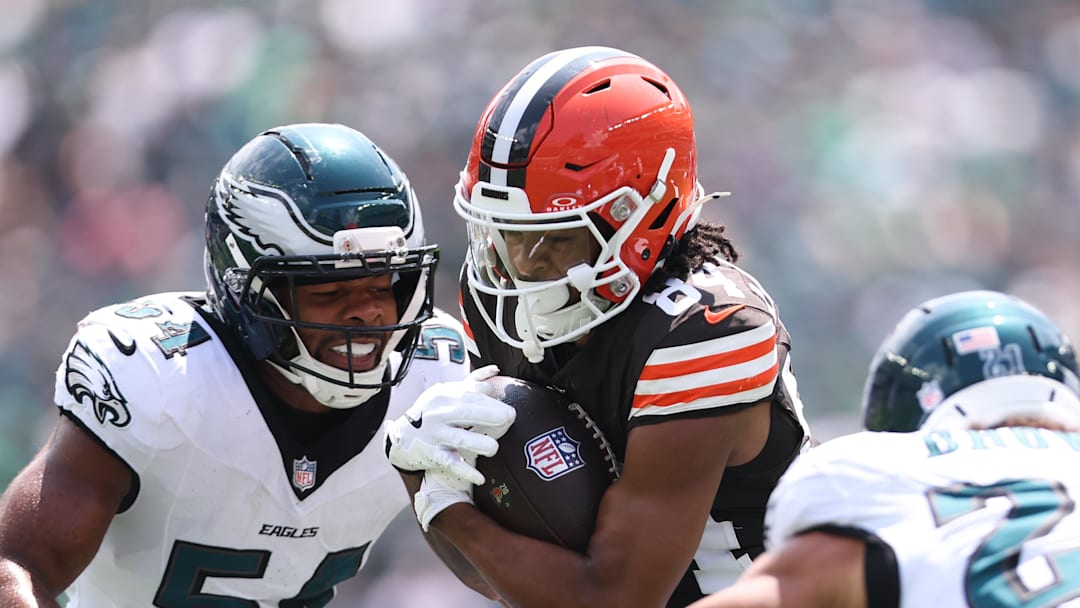 Aug 16, 2025; Philadelphia, Pennsylvania, USA; Cleveland Browns wide receiver Gage Larvadain (84) runs with the ball against Philadelphia Eagles linebacker Jeremiah Trotter Jr. (54) and safety Sydney Brown (21) during the first quarter at Lincoln Financial Field. Mandatory Credit: Bill Streicher-Imagn Images