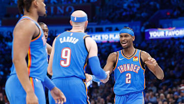 Jan 23, 2025; Oklahoma City, Oklahoma, USA; Oklahoma City Thunder guard Shai Gilgeous-Alexander (2) celebrates with guard Alex Caruso (9) after a basket against the Dallas Mavericks during the second half at Paycom Center. Mandatory Credit: Alonzo Adams-Imagn Images