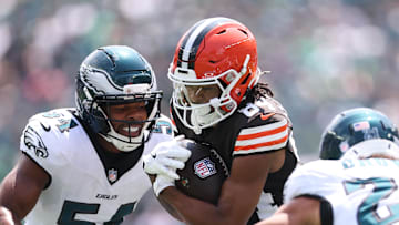 Aug 16, 2025; Philadelphia, Pennsylvania, USA; Cleveland Browns wide receiver Gage Larvadain (84) runs with the ball against Philadelphia Eagles linebacker Jeremiah Trotter Jr. (54) and safety Sydney Brown (21) during the first quarter at Lincoln Financial Field. Mandatory Credit: Bill Streicher-Imagn Images
