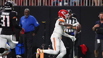 Sep 22, 2024; Atlanta, Georgia, USA; Kansas City Chiefs wide receiver Rashee Rice (4) scores a touchdown against the Atlanta Falcons in the second quarter at Mercedes-Benz Stadium. Mandatory Credit: Brett Davis-Imagn Images