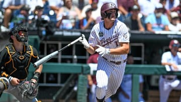 Jun 23, 2024; Omaha, NE, USA;  Texas A&M Aggies right fielder Jace Laviolette (17) hits a home run against the Tennessee Volunteers during the first inning at Charles Schwab Field Omaha. Mandatory Credit: Steven Branscombe-USA TODAY Sports