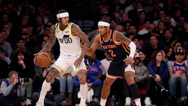 Utah Jazz guard Jordan Clarkson (00) controls the ball against New York Knicks guard Miles McBride (2) during the first