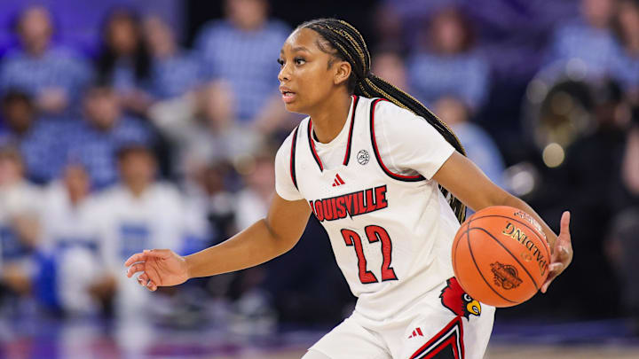 Mar 7, 2026; Duluth, GA, USA; Louisville Cardinals guard Tajianna Roberts (22) dribbles against the North Carolina Tar Heels in the third quarter at Gas South Arena. Mandatory Credit: Brett Davis-Imagn Images