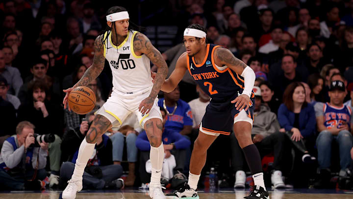 Jan 30, 2024; New York, New York, USA; Utah Jazz guard Jordan Clarkson (00) controls the ball against New York Knicks guard Miles McBride (2) during the first quarter at Madison Square Garden. Mandatory Credit: Brad Penner-Imagn Images