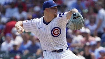 Aug 6, 2025; Chicago, Illinois, USA; Chicago Cubs pitcher Cade Horton (22) throws the ball against the Cincinnati Reds during the first inning at Wrigley Field. 