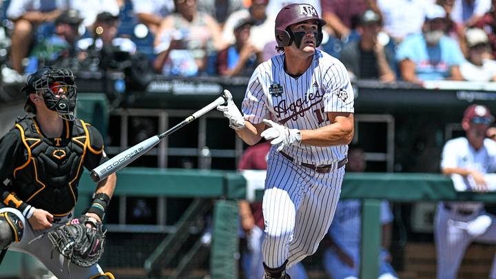 Jun 23, 2024: Texas A&M Aggies right fielder Jace Laviolette (17) hits a home run against the Tennessee Volunteers during the first inning at Charles Schwab Field Omaha. Credit: Steven Branscombe-USA TODAY Sports