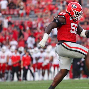Sep 6, 2025; Athens, Georgia, USA; Georgia Bulldogs defensive lineman Christen Miller (52) reacts after a defensive stop against the Austin Peay Governors in the fourth quarter at Sanford Stadium. Mandatory Credit: Brett Davis-Imagn Images