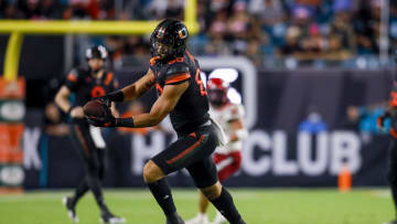 Oct 23, 2021; Miami Gardens, Florida, USA; Miami Hurricanes tight end Elijah Arroyo (80) catches the football against the North Carolina State Wolfpack during the second half of the game at Hard Rock Stadium. Mandatory Credit: Sam Navarro-USA TODAY Sports