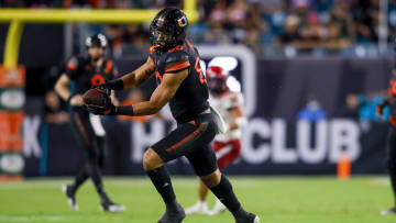 Oct 23, 2021; Miami Gardens, Florida, USA; Miami Hurricanes tight end Elijah Arroyo (80) catches the football against the North Carolina State Wolfpack during the second half of the game at Hard Rock Stadium. Mandatory Credit: Sam Navarro-USA TODAY Sports