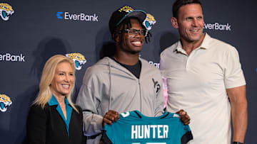 Apr 25, 2025; Jacksonville, FL, USA; Jacksonville Jaguars first round draft pick Travis Hunter poses for a photo with executive vice president of football operations Tony Boselli during a press conference at Miller Electric Center. Mandatory Credit: Travis Register-Imagn Images