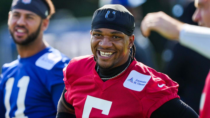 Indianapolis Colts quarterback Anthony Richardson (5) smiles while warming up Saturday, July 27, 2024, during the Indianapolis Colts’ training camp at Grand Park Sports Complex in Westfield.