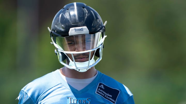 Running back Tony Pollard (20) participates in drills during the Tennessee Titans mandatory mini-camp at Ascension Saint Thomas Sports Park in Nashville, Tenn., Thursday, June 6, 2024.