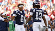 Nov 8, 2025; Oxford, Mississippi, USA; Mississippi Rebels quarterback Trinidad Chambliss (6) reacts with quarterback Austin Simmons (13) during the fourth quarter against The Citadel Bulldogs at Vaught-Hemingway Stadium. Mandatory Credit: Petre Thomas-Imagn Images