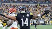 Nov 16, 2025; Pittsburgh, Pennsylvania, USA; Pittsburgh Steelers running back Kenneth Gainwell (14) reacts after a play against the Cincinnati Bengals during the second half at Acrisure Stadium. Mandatory Credit: Charles LeClaire-Imagn Images