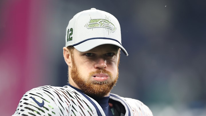 Sam Darnold of the Seattle Seahawks blows out