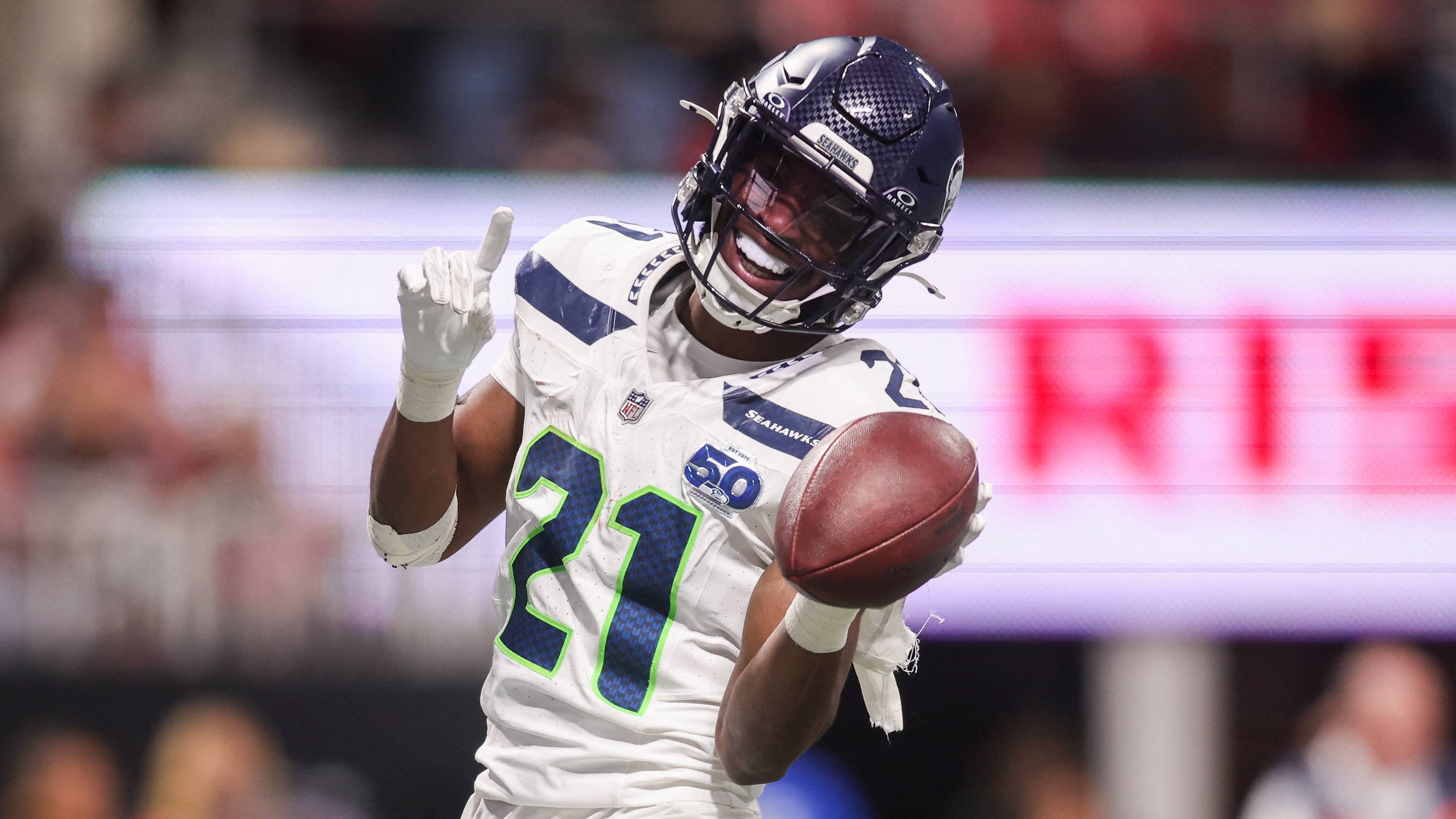 Dec 7, 2025; Atlanta, Georgia, USA; Seattle Seahawks cornerback Devon Witherspoon (21) celebrates after a fumble recovery against the Atlanta Falcons in the third quarter at Mercedes-Benz Stadium. Mandatory Credit: Brett Davis-Imagn Images