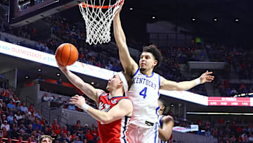 Feb 4, 2025; Oxford, Mississippi, USA; Mississippi Rebels guard Sean Pedulla (3) shoots as Kentucky Wildcats guard Koby Brea (4) defends during the second half at The Sandy and John Black Pavilion at Ole Miss. Mandatory Credit: Petre Thomas-Imagn Images