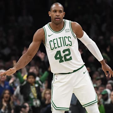 Apr 21, 2024; Boston, Massachusetts, USA; Boston Celtics center Al Horford (42) is congratulated by guard Jaylen Brown (7) after a basket during the second half in game one of the first round for the 2024 NBA playoffs against the Miami Heat at TD Garden. Mandatory Credit: Bob DeChiara-Imagn Images