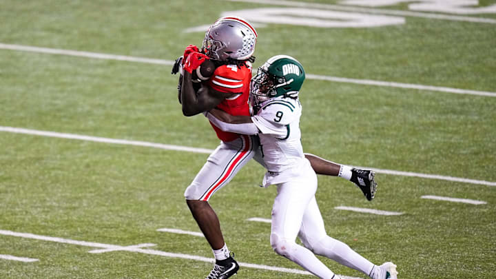 Ohio State Buckeyes wide receiver Jeremiah Smith (4) catches a pass against Ohio Bobcats cornerback Michael Mack II (9) in the second half at the Ohio Stadium on Saturday, Sept. 13, 2025 in Columbus, Ohio.