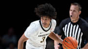 Vanderbilt guard Tyler Tanner (3) brings the ball up court against Virginia during the first half of their exhibition game at Memorial Gym in Nashville, Tenn., Thursday, Oct. 16, 2025.