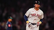 Apr 22, 2025; Boston, Massachusetts, USA; Boston Red Sox first base Triston Casas (36) hits a three run home run against the Seattle Mariners in the seventh inning at Fenway Park. Mandatory Credit: David Butler II-Imagn Images
