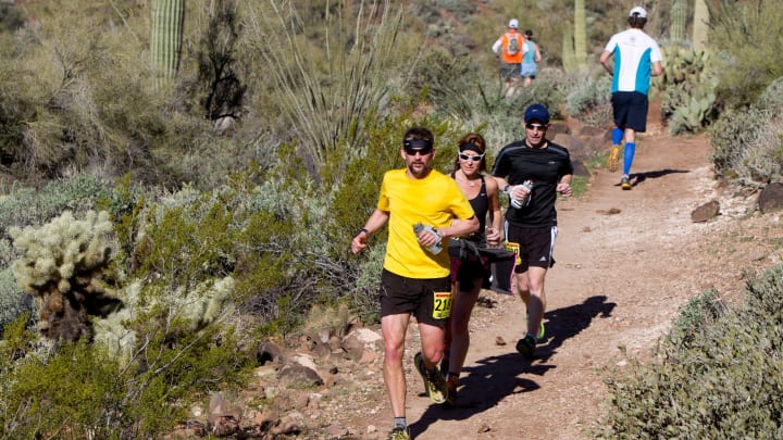 Jon Aardal (from front), Nadine Hamilton and Craig Branaghan compete in the Aravaipa Running Elephant Mountain Desert Runner Trail Series at Cave Creek Regional Park.