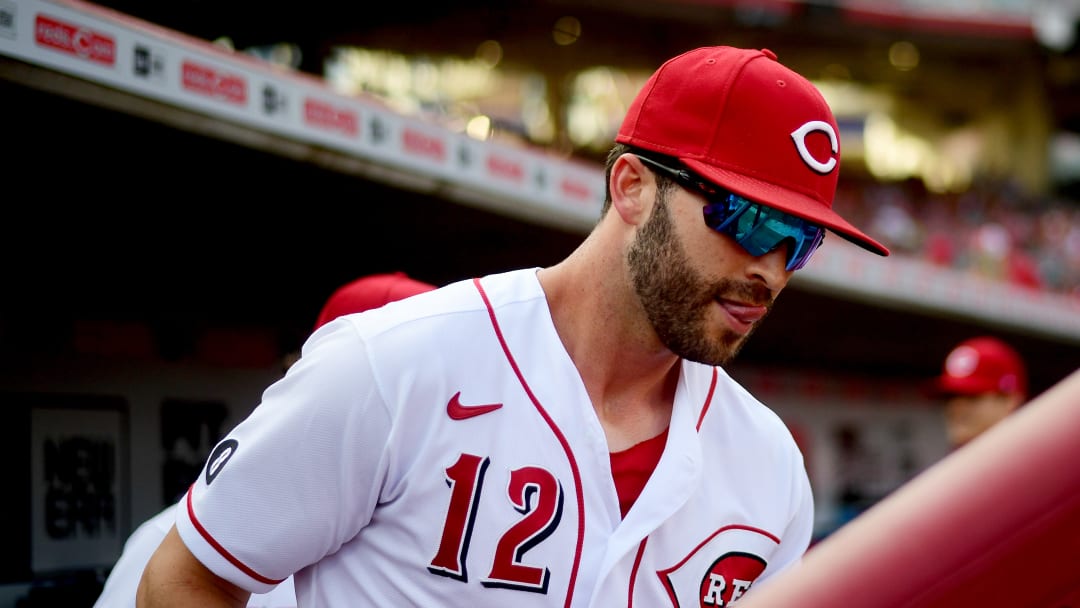 Reds outfielder Tyler Naquin emerges from the dugout. Reds outfielder Tyler Naquin emerges from the dugout.