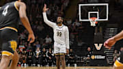 Nov 15, 2025; Nashville, Tennessee, USA;  Vanderbilt Commodores forward Devin McGlockton (99) reacts after a made three point basket  against the Arkansas-Pine Bluff Golden Lions during the second half at Memorial Gymnasium. Mandatory Credit: Steve Roberts-Imagn Images