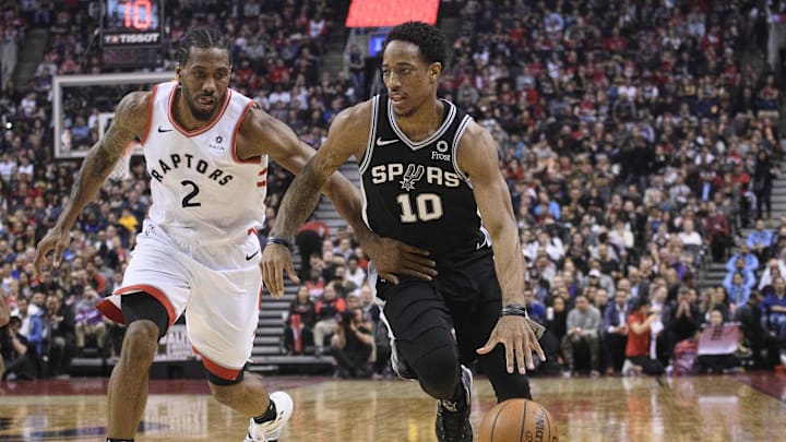 San Antonio Spurs guard DeMar DeRozan (10) and Toronto Raptors forward Kawhi Leonard (2) at Scotiabank Arena. 