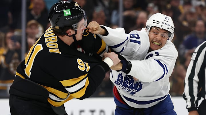 Mar 24, 2026; Boston, Massachusetts, USA; Toronto Maple Leafs center Dakota Joshua (81) fights with Boston Bruins defenseman Nikita Zadorov (91) during the third period at TD Garden. Mandatory Credit: Winslow Townson-Imagn Images