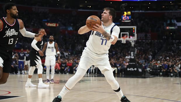 Apr 23, 2024; Los Angeles, California, USA; Dallas Mavericks guard Luka Doncic (77) looks to shoot