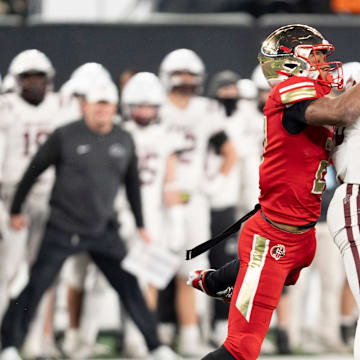 Nov 29, 2024; East Rutherford, NJ, USA; Bergen Catholic vs. Don Bosco in the NJSIAA Non-Public A football final at MetLife Stadium. DB #2 Isaiah Alvarez makes a catch as BC #21 Jordan Thomas tries to break up the pass.