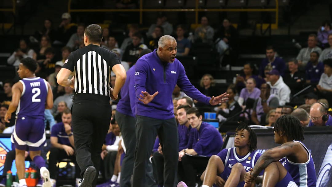 Kansas State  coach Jerome Tang talks to his team while playing Iowa in a first-round NIT game Tuesday, March 19, 2024 at Carver-Hawkeye Arena in Iowa City, Iowa.