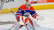 Oct 8, 2025; Edmonton, Alberta, CAN; Edmonton Oilers goaltender Stuart Skinner (74) makes a save during warmup against the Calgary Flames at Rogers Place. Mandatory Credit: Perry Nelson-Imagn Images