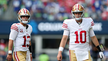 San Francisco 49ers quarterbacks Brock Purdy (L) and Mac Jones (R)