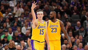 Dec 19, 2024; Sacramento, California, USA; Los Angeles Lakers guard Austin Reaves (15) reacts after making a three point basket against the Sacramento Kings in the fourth quarter at the Golden 1 Center. Mandatory Credit: Cary Edmondson-Imagn Images