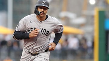 Apr 5, 2025; Pittsburgh, Pennsylvania, USA;  New York Yankees center fielder Trent Grisham (12) circles the bases after hitting a three run home run against the Pittsburgh Pirates during the fifth inning at PNC Park. Mandatory Credit: Charles LeClaire-Imagn Images