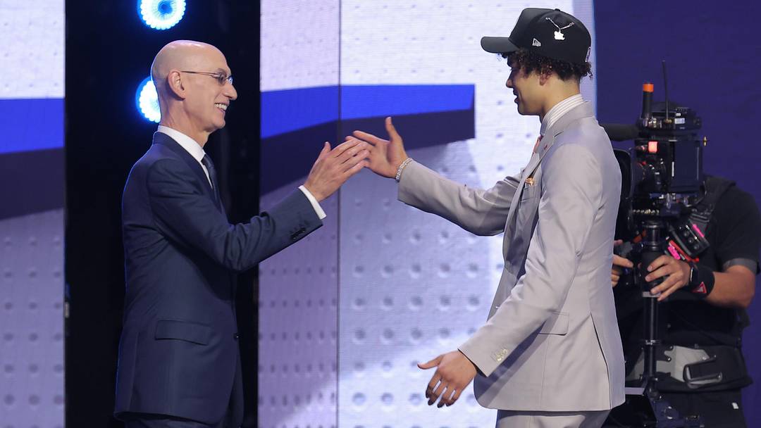 Jun 23, 2026; New York, NY, USA; NBA commissioner Adam Silver greets the fifth pick in the 2026 NBA draft, Illinois guard Keaton Wagler after he was selected by the Los Angeles Clippers at Barclays Center. Mandatory Credit: Brad Penner-Imagn Images