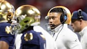 Jan 20, 2025; Atlanta, GA, USA; Notre Dame Fighting Irish head coach Marcus Freeman against the Ohio State Buckeyes during the CFP National Championship college football game at Mercedes-Benz Stadium.